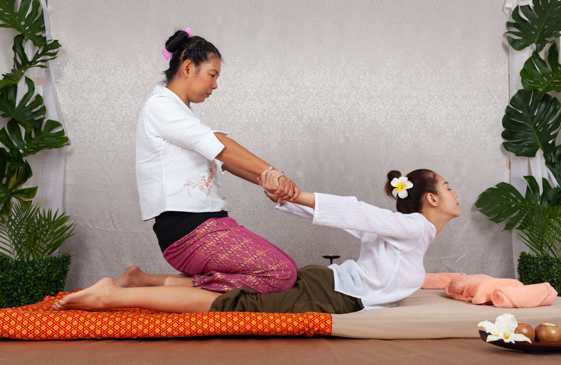 Thai massage with assisted stretching